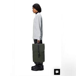 Brand new with tags Rains backpack. Army green and black.